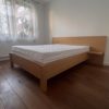 Dębowe łóżko DORM na solidnej podstawie ze stelażem